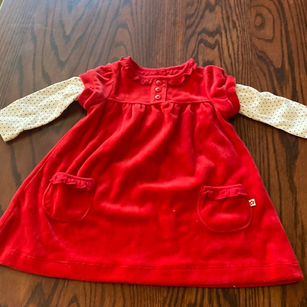 Solid red velvet dress with polkadot sleeves and pockets
